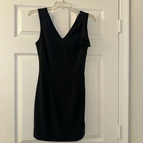 bebe Dresses & Skirts - Black Mini Bebé Dress!